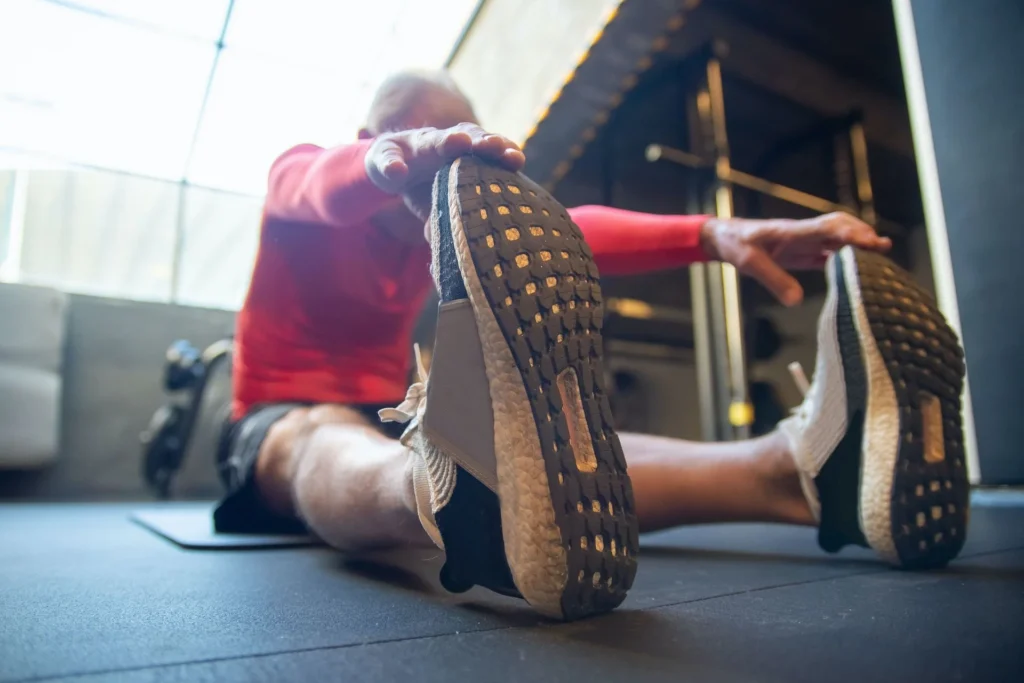 attorney doing a hamstring stretch