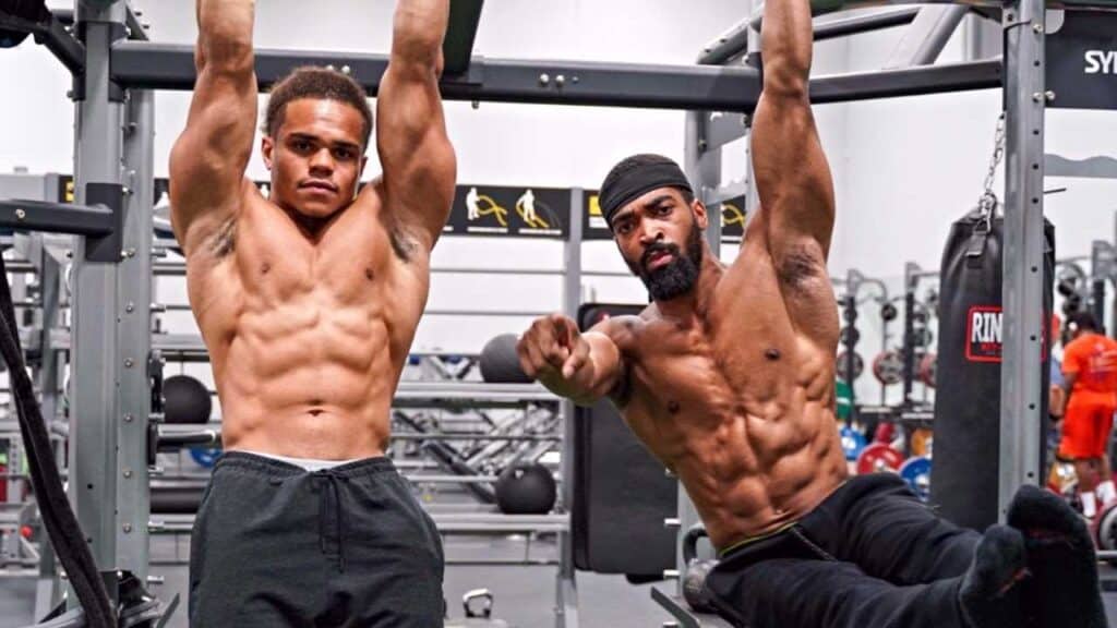 Two guys with ripped abs who use the best abdominal exercises we discuss below. 