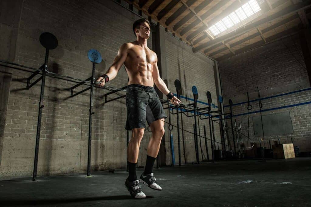 male athlete using specialized routines for jumping rope to get ripped